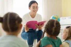 front view woman reading something her students 2